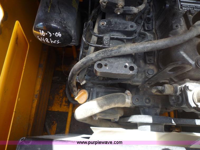 image for item 2156 1993 John Deere 675B skid steer