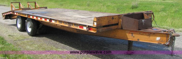 image for item 3345 Backhoe Pro 23' Econoline 12 ton trailer