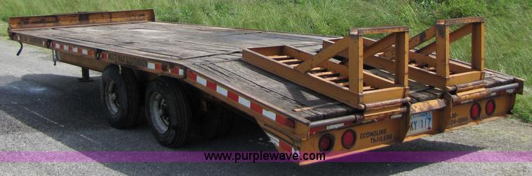 image for item 3345 Backhoe Pro 23' Econoline 12 ton trailer