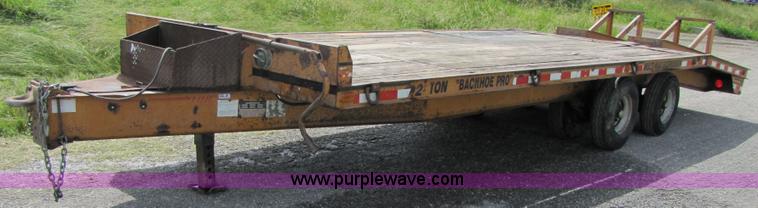 image for item 3345 Backhoe Pro 23' Econoline 12 ton trailer