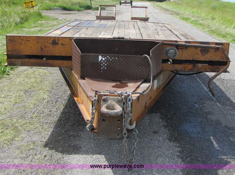 image for item 3345 Backhoe Pro 23' Econoline 12 ton trailer