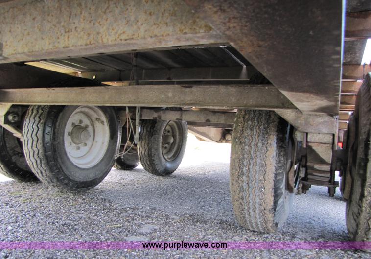 image for item 3345 Backhoe Pro 23' Econoline 12 ton trailer