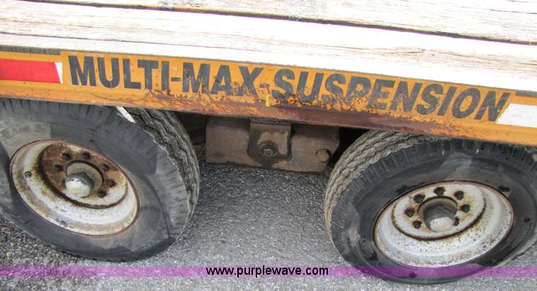 image for item 3345 Backhoe Pro 23' Econoline 12 ton trailer