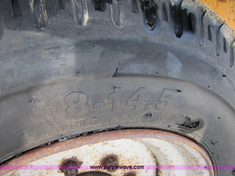 image for item 3345 Backhoe Pro 23' Econoline 12 ton trailer