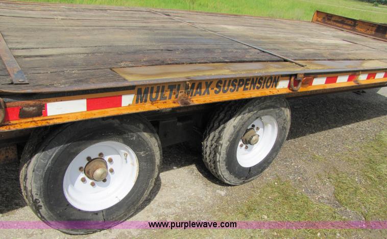 image for item 3345 Backhoe Pro 23' Econoline 12 ton trailer