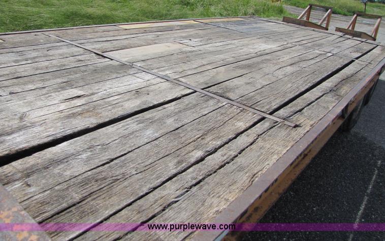 image for item 3345 Backhoe Pro 23' Econoline 12 ton trailer