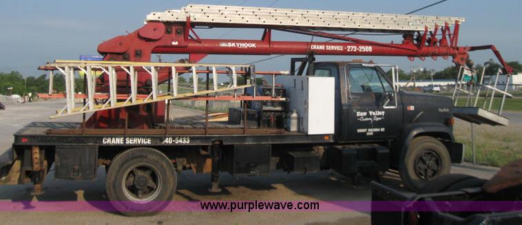 image for item 7235 1989 GMC Topkick C7D042 ladder truck