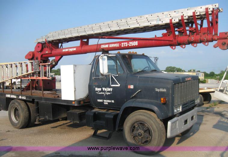 image for item 7235 1989 GMC Topkick C7D042 ladder truck