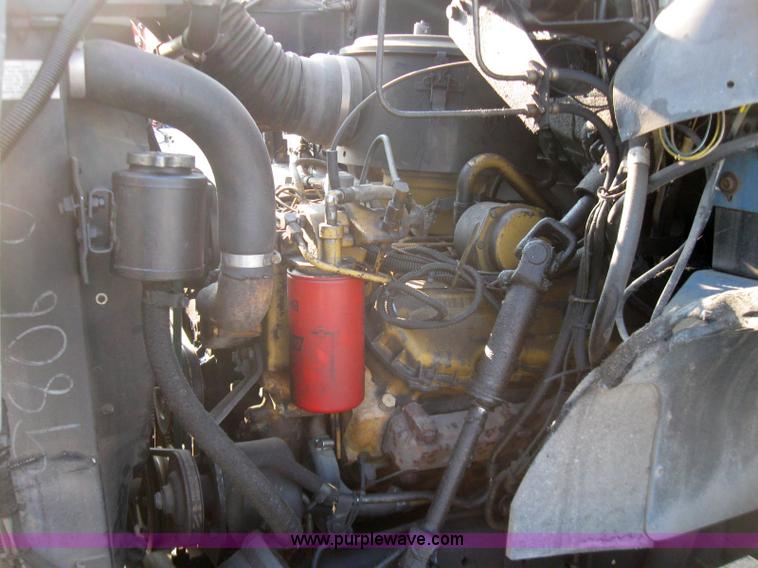 image for item 7235 1989 GMC Topkick C7D042 ladder truck