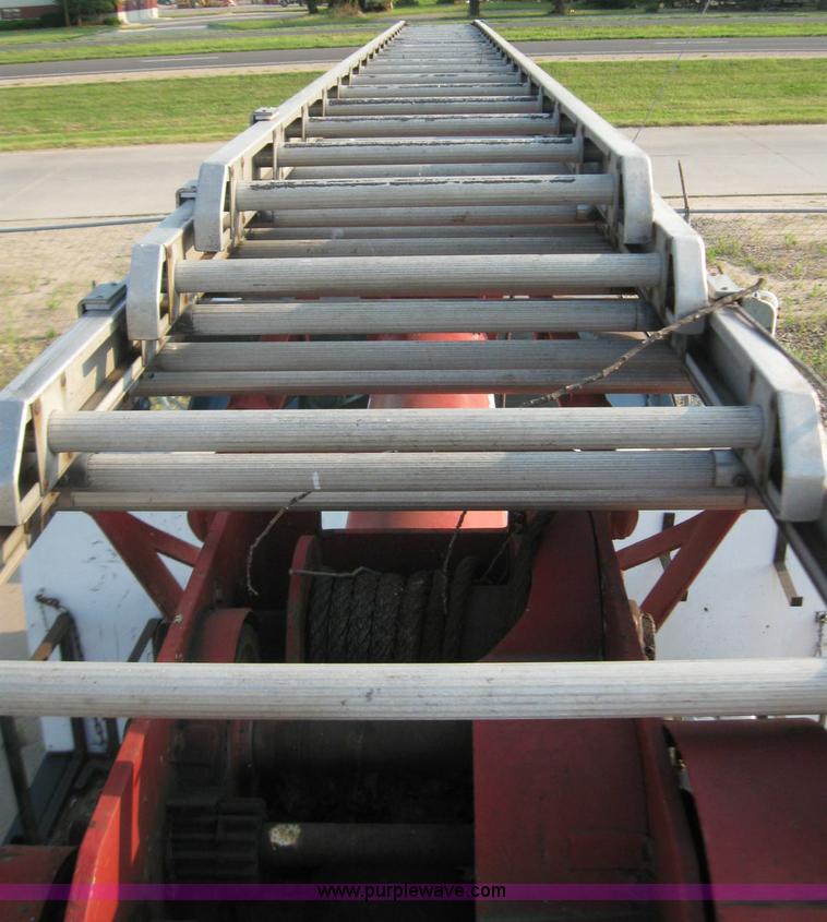 image for item 7235 1989 GMC Topkick C7D042 ladder truck