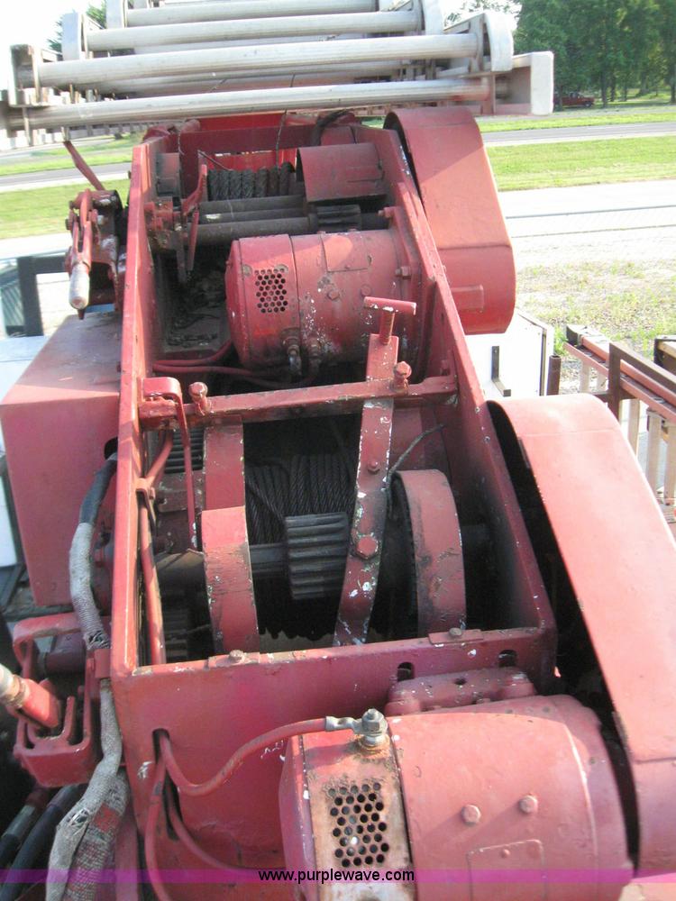 image for item 7235 1989 GMC Topkick C7D042 ladder truck