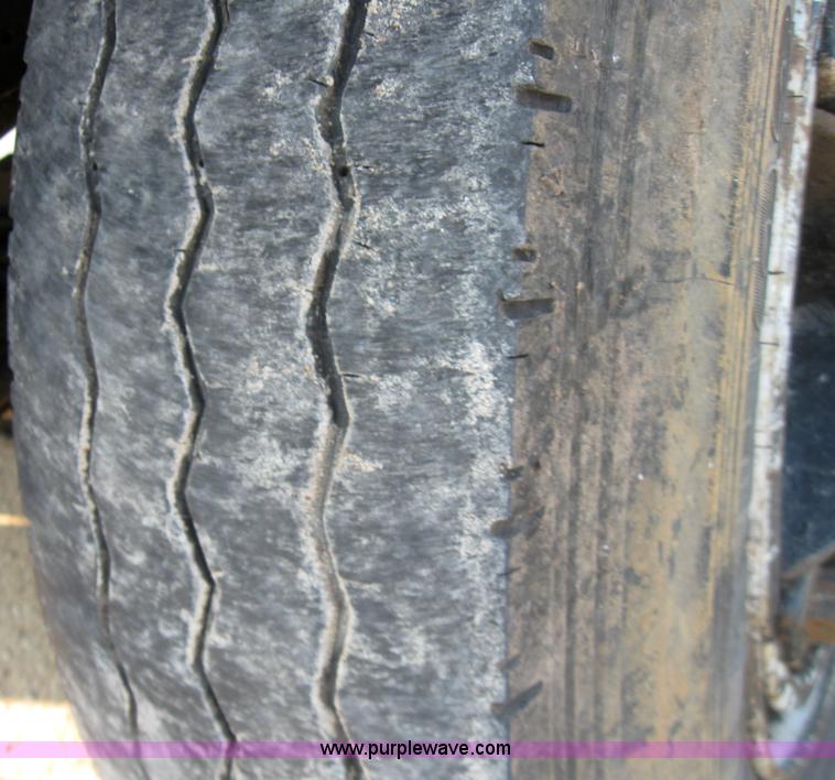 image for item 7235 1989 GMC Topkick C7D042 ladder truck