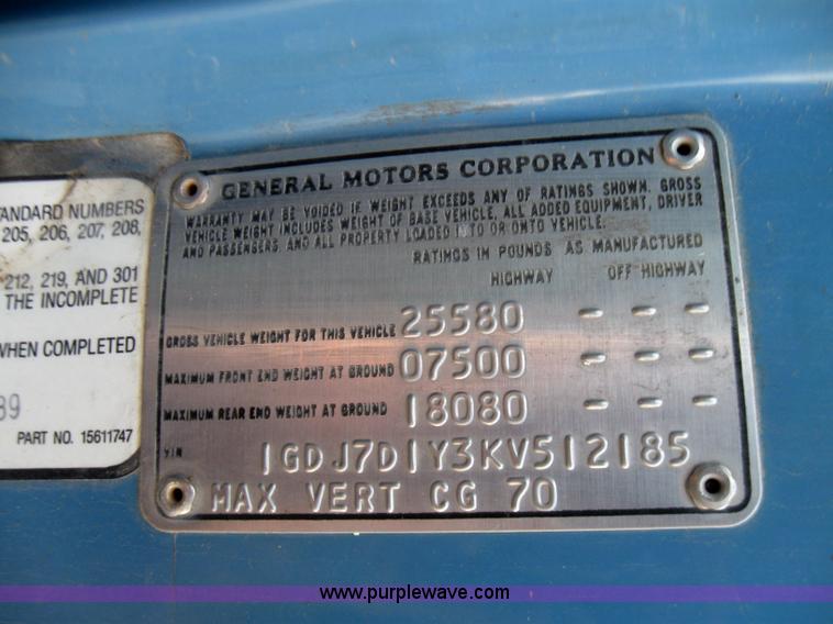 image for item 7235 1989 GMC Topkick C7D042 ladder truck