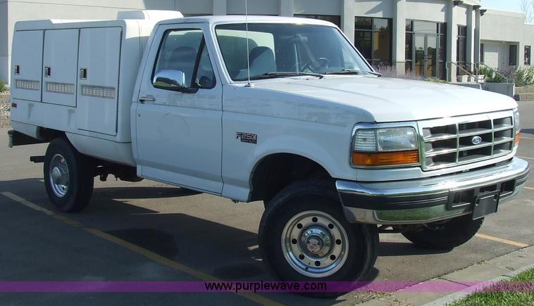 image for item 2093 1997 Ford F250 pickup truck with Shoreline Animobile animal transport boxes