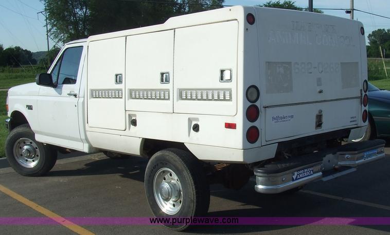 image for item 2093 1997 Ford F250 pickup truck with Shoreline Animobile animal transport boxes
