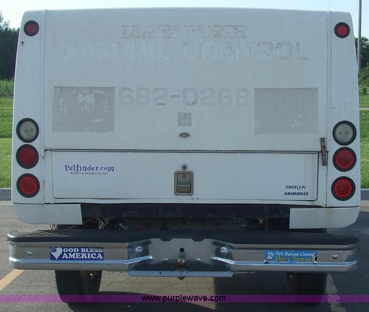 image for item 2093 1997 Ford F250 pickup truck with Shoreline Animobile animal transport boxes