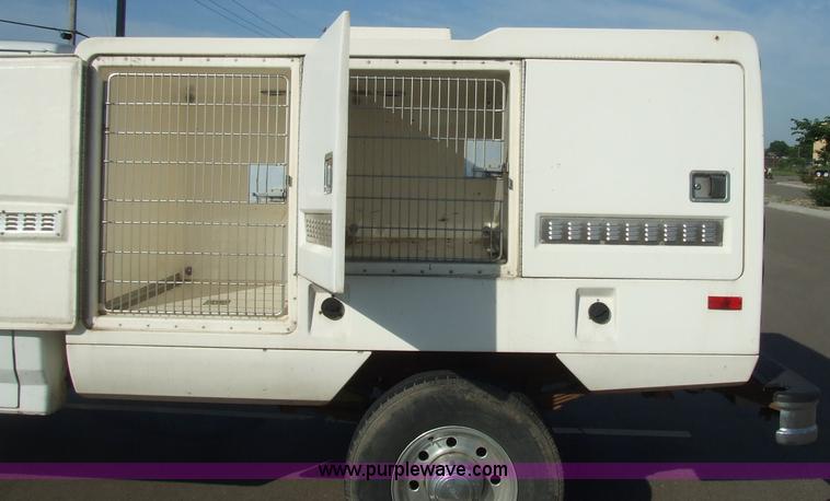 image for item 2093 1997 Ford F250 pickup truck with Shoreline Animobile animal transport boxes