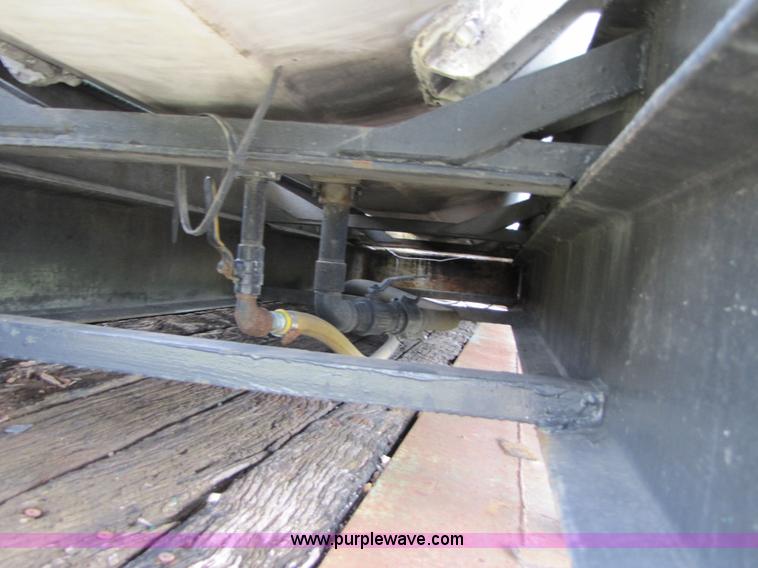 image for item 3507 Dual tank chemical mixer tank on truck bed