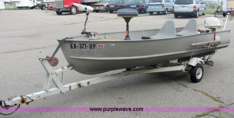 image for item 4636 Aluma-Craft 14' V-bottom boat and trailer