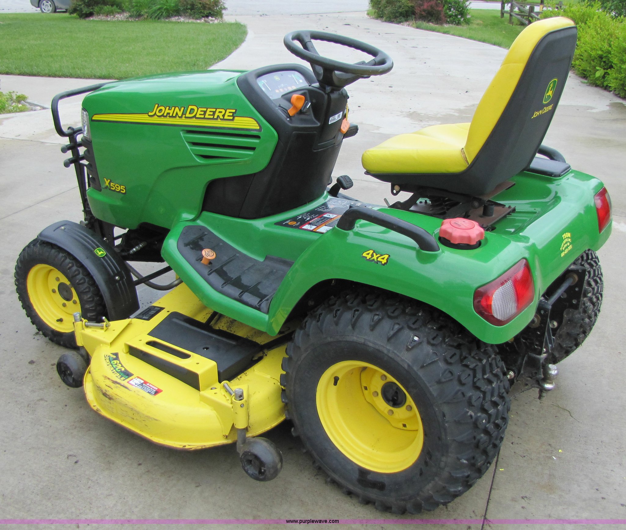 John Deere X595 lawn tractor with mower in Liberty, MO Item 3295 sold Purple Wave