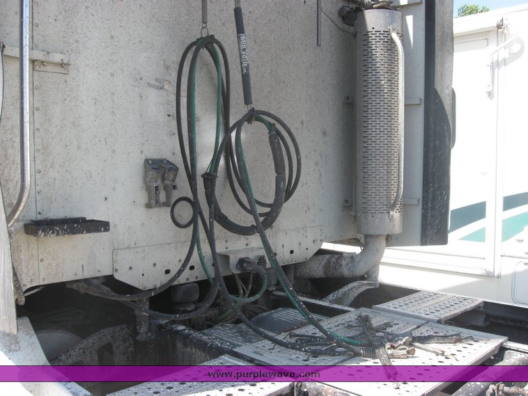 image for item 2149 2000 Freightliner Conventional FLC120 Century Class semi truck