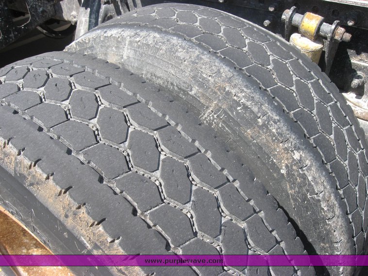 image for item 2149 2000 Freightliner Conventional FLC120 Century Class semi truck