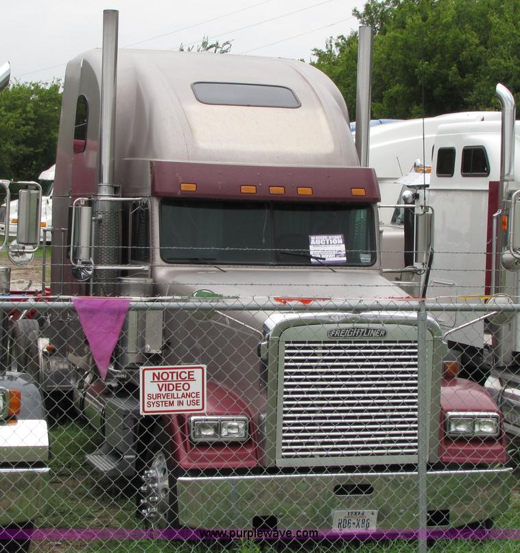image for item 8000 2002 Freightliner Conventional FLD120 semi truck
