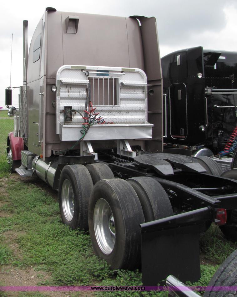 image for item 8000 2002 Freightliner Conventional FLD120 semi truck