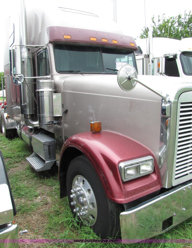 image for item 8000 2002 Freightliner Conventional FLD120 semi truck