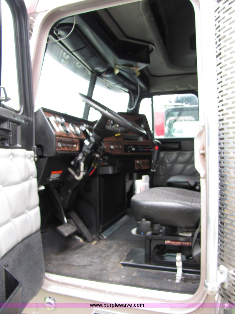 image for item 8000 2002 Freightliner Conventional FLD120 semi truck