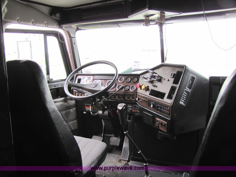 image for item 8000 2002 Freightliner Conventional FLD120 semi truck