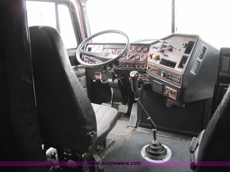 image for item 8000 2002 Freightliner Conventional FLD120 semi truck