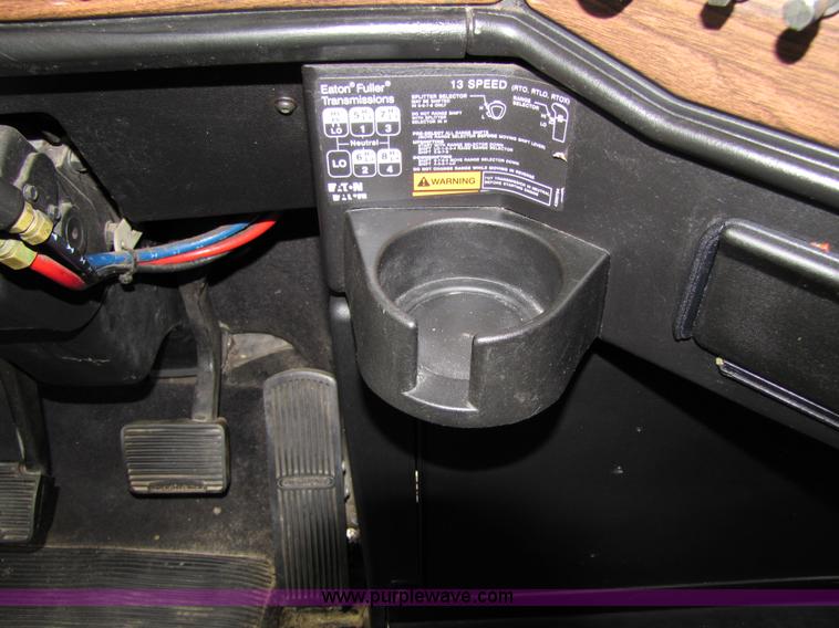 image for item 8000 2002 Freightliner Conventional FLD120 semi truck