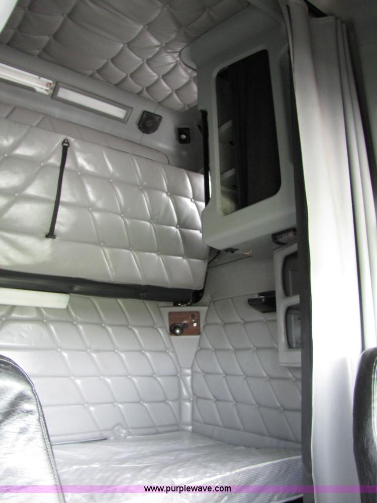 image for item 8000 2002 Freightliner Conventional FLD120 semi truck