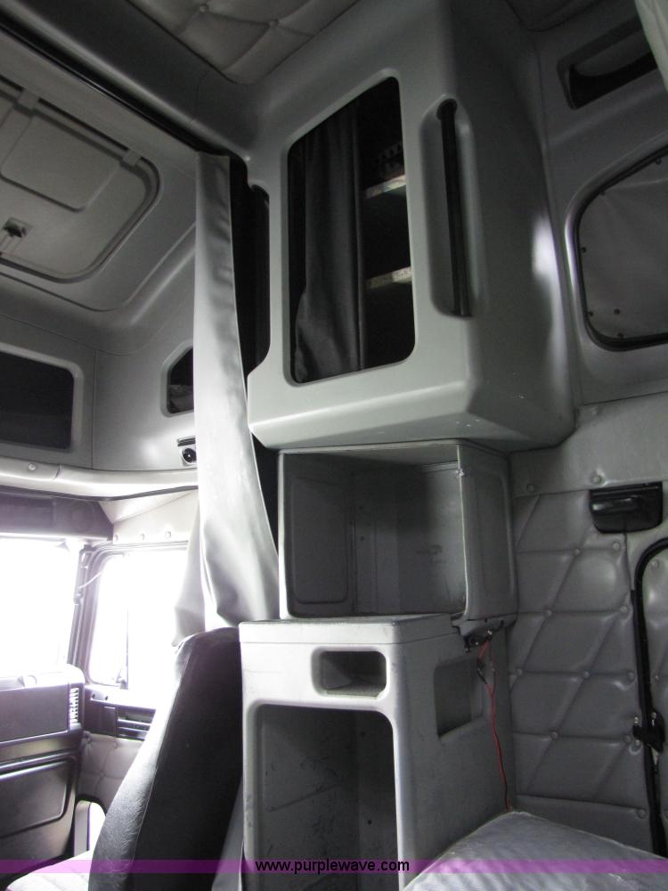 image for item 8000 2002 Freightliner Conventional FLD120 semi truck