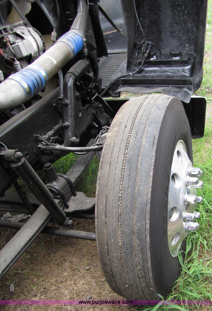 image for item 8000 2002 Freightliner Conventional FLD120 semi truck