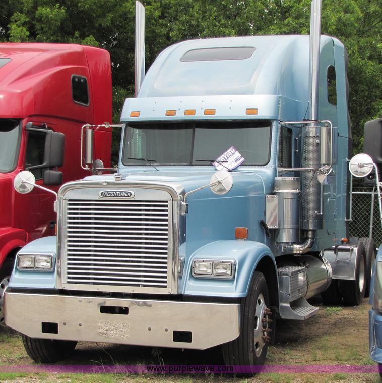 image for item 8002 2002 Freightliner Conventional FLD120 semi truck