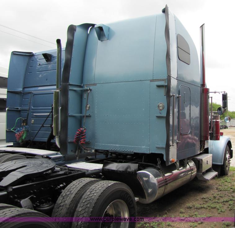 image for item 8002 2002 Freightliner Conventional FLD120 semi truck