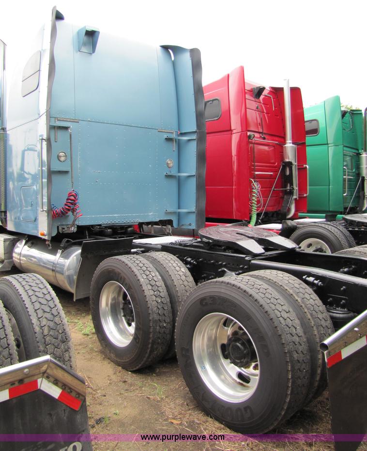 image for item 8002 2002 Freightliner Conventional FLD120 semi truck