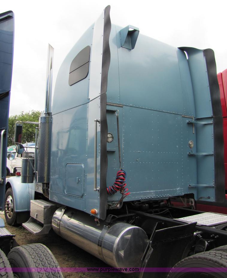 image for item 8002 2002 Freightliner Conventional FLD120 semi truck