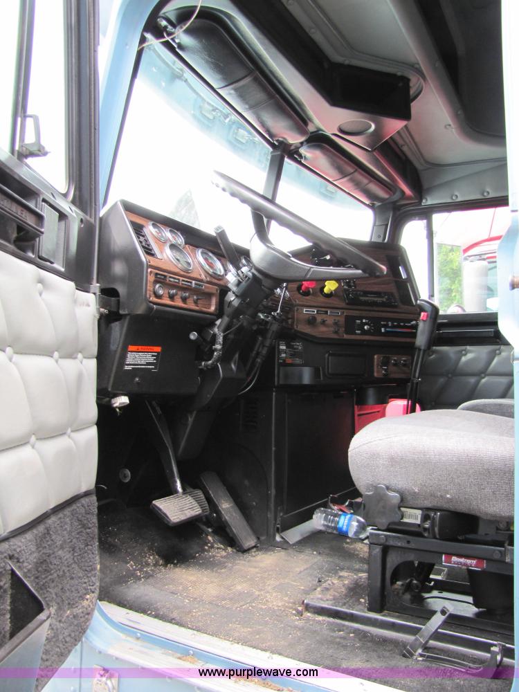 image for item 8002 2002 Freightliner Conventional FLD120 semi truck