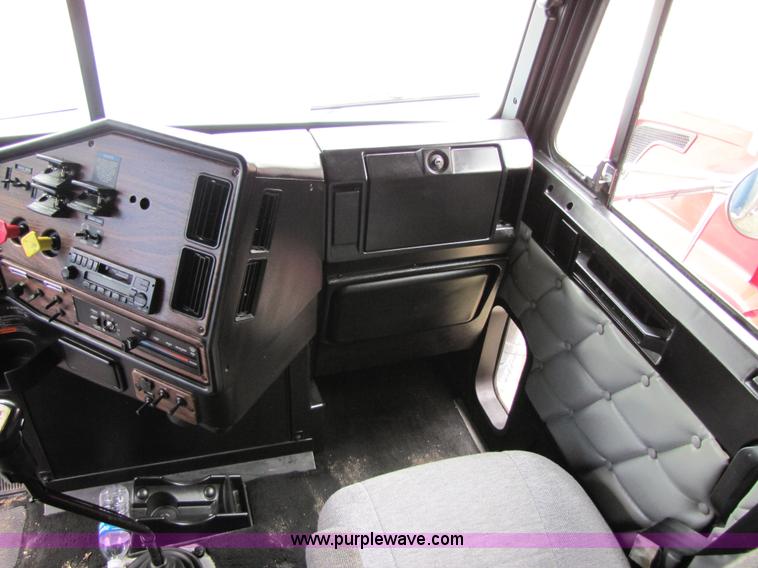 image for item 8002 2002 Freightliner Conventional FLD120 semi truck