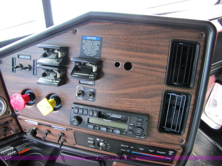 image for item 8002 2002 Freightliner Conventional FLD120 semi truck