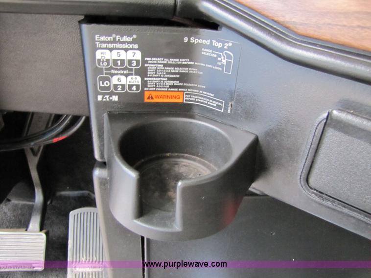 image for item 8002 2002 Freightliner Conventional FLD120 semi truck