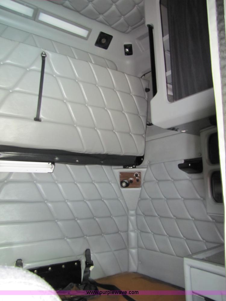 image for item 8002 2002 Freightliner Conventional FLD120 semi truck