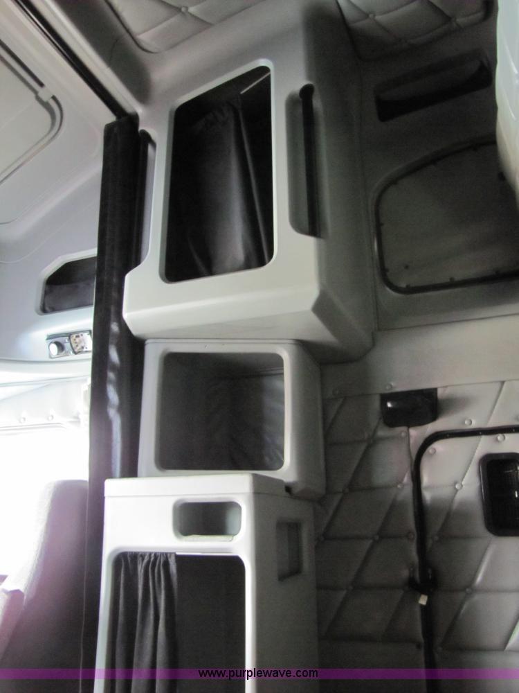 image for item 8002 2002 Freightliner Conventional FLD120 semi truck