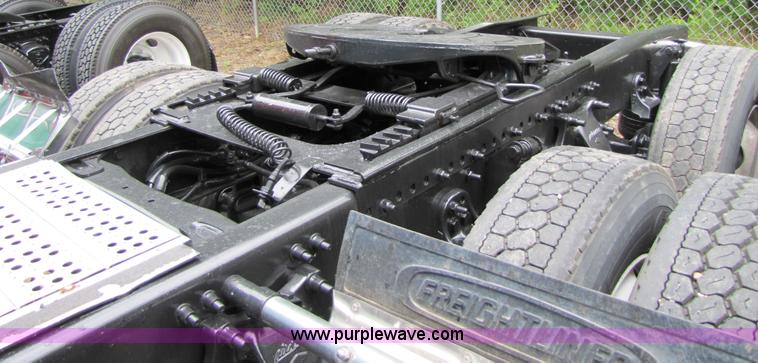 image for item 8002 2002 Freightliner Conventional FLD120 semi truck