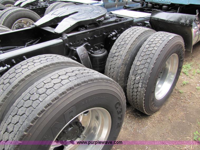 image for item 8002 2002 Freightliner Conventional FLD120 semi truck