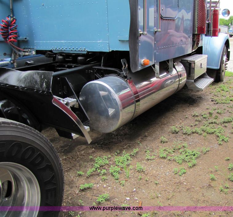 image for item 8002 2002 Freightliner Conventional FLD120 semi truck