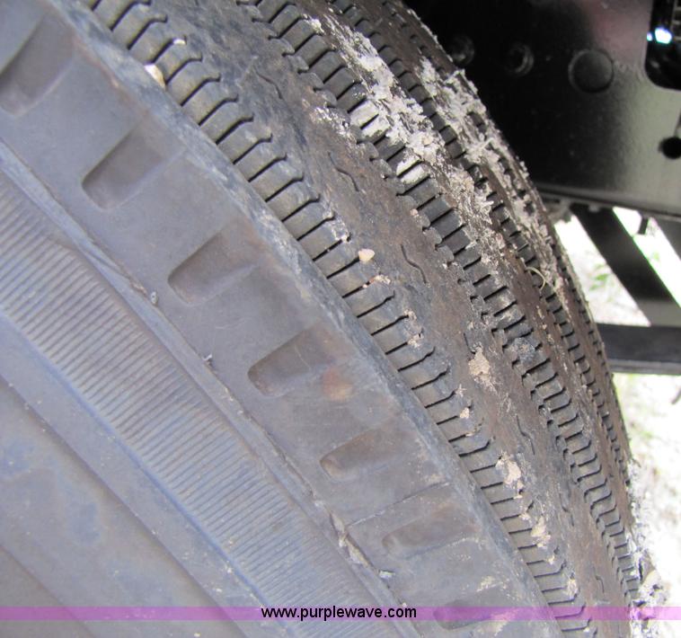 image for item 8002 2002 Freightliner Conventional FLD120 semi truck